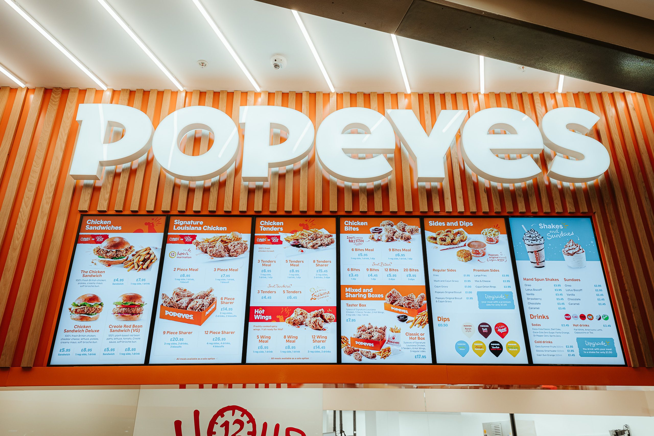 Popeyes owner sees system-wide sales rise 14% in Q2